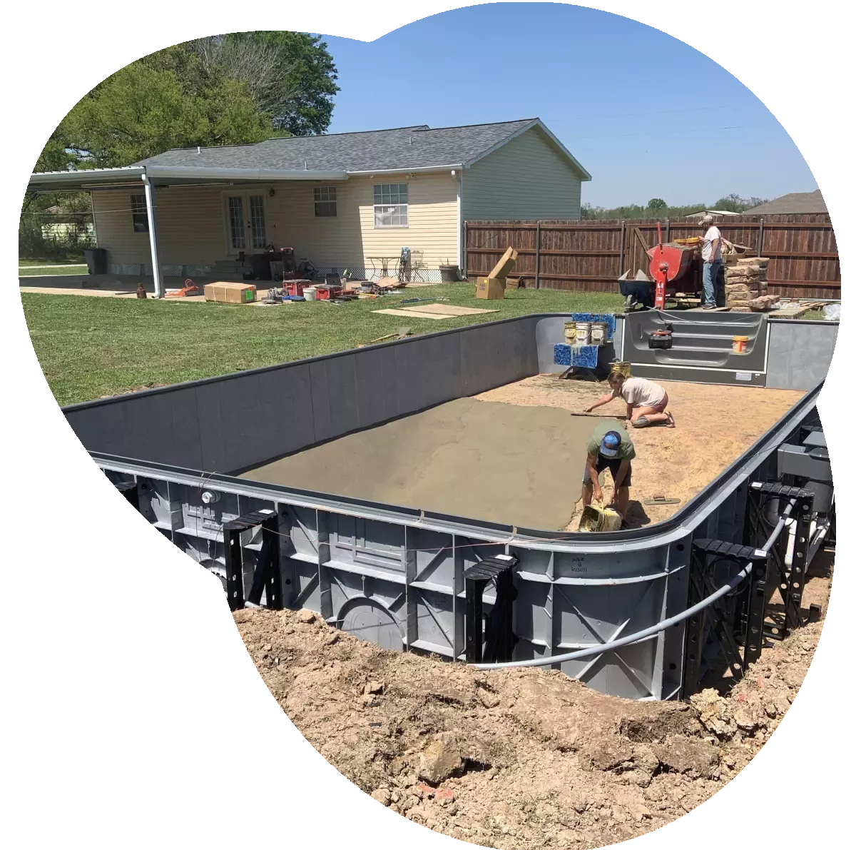 A vinyl pool being constructed.